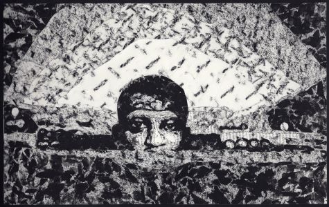 A man looks out from the ground, out of a manhole