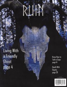 A figure with a ram skull for a head looks out from the cover of a magazine that has blue highlights within the image